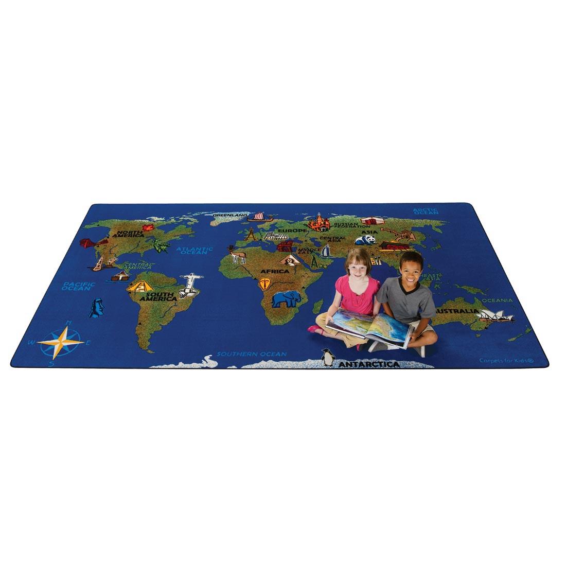 Continental Wonders Rug by Carpets For Kids, with a young boy and girl sitting together on the rug, reading a book