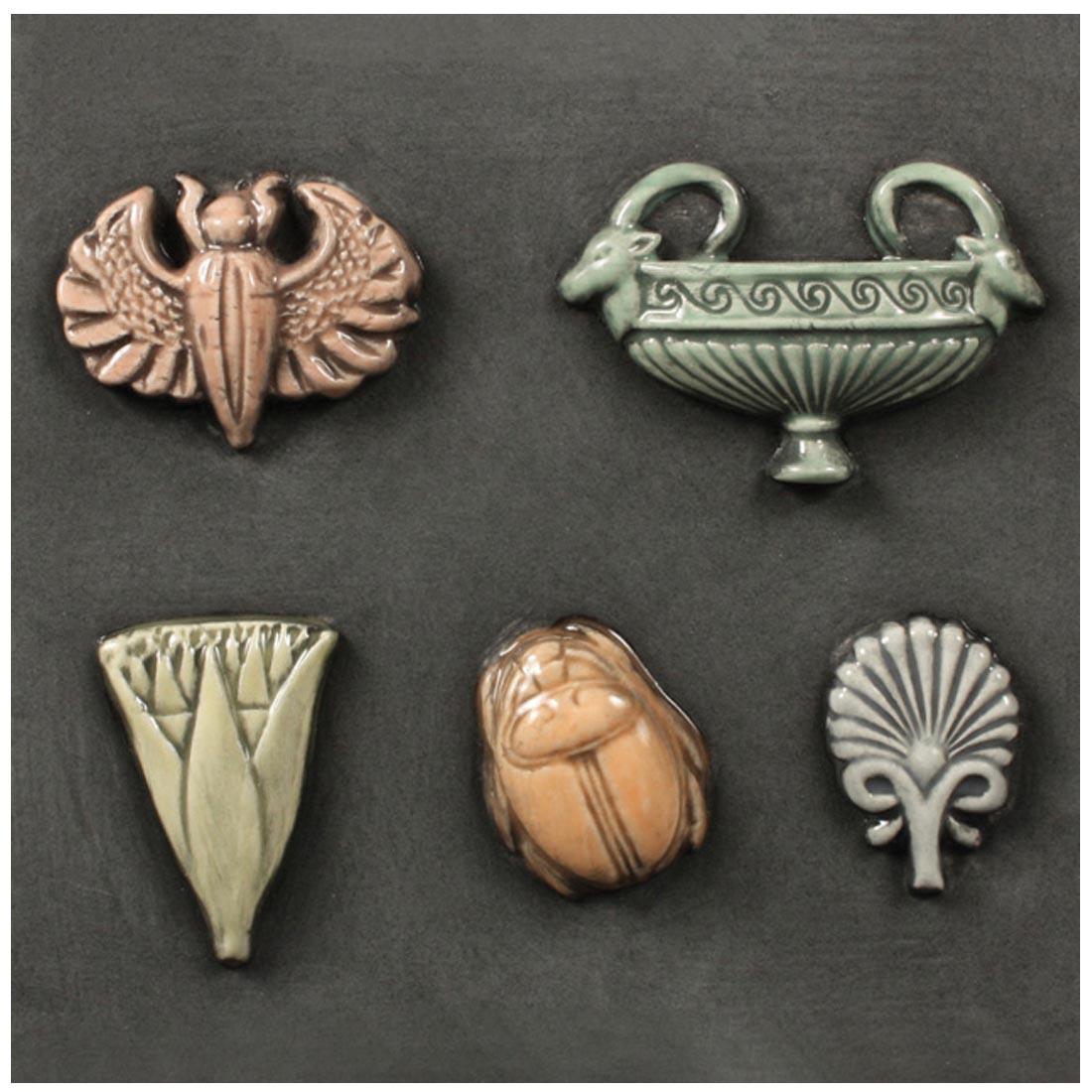 Clay pieces made with Mayco Egyptian Sprig Molds