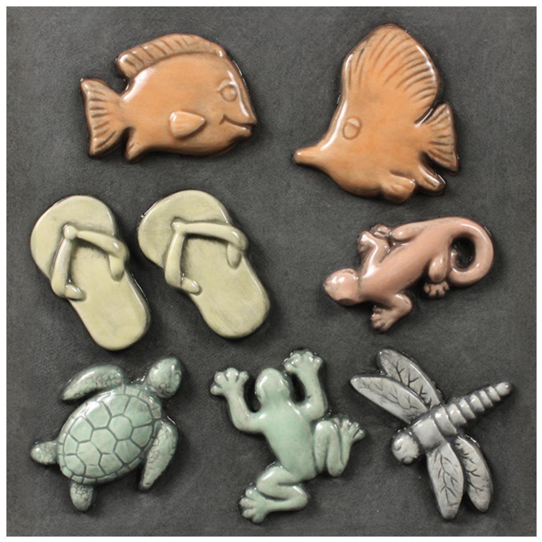 Clay pieces made with Mayco Aquatic Sprig Molds