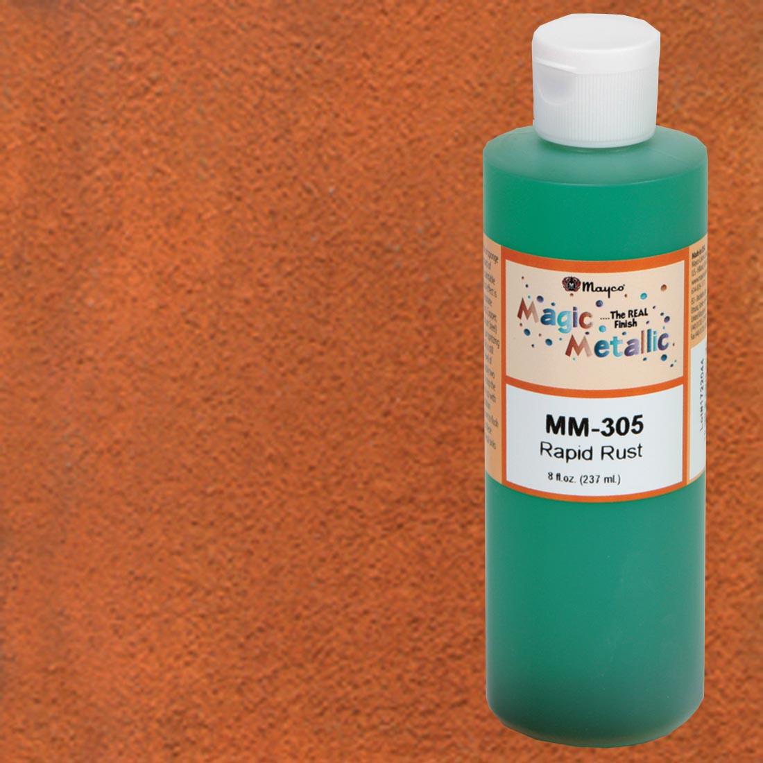 Bottle of Rapid Rust Magic Metallic Patina with a Sample Tile for the background