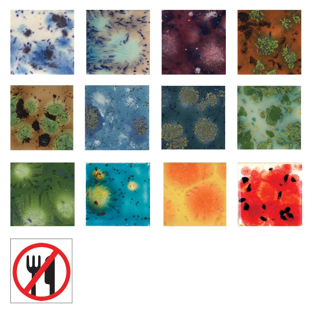 Clay Tile Samples of the 12 colors of the Mayco Crystalites Glaze Set along with the symbol for non-food safe
