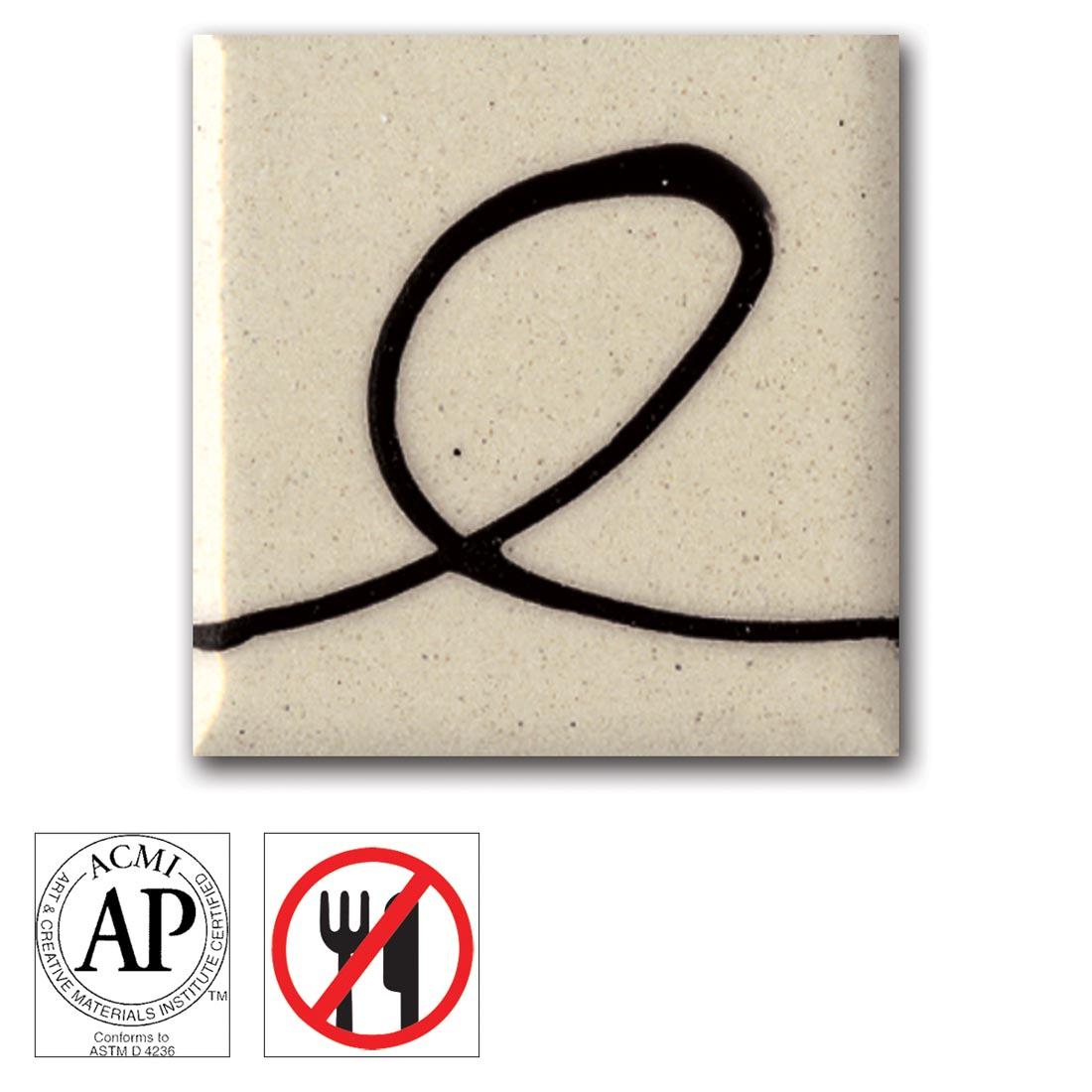 Clay tile with Mayco Black Designer Liner applied; symbols for AP Seal and non-food safe