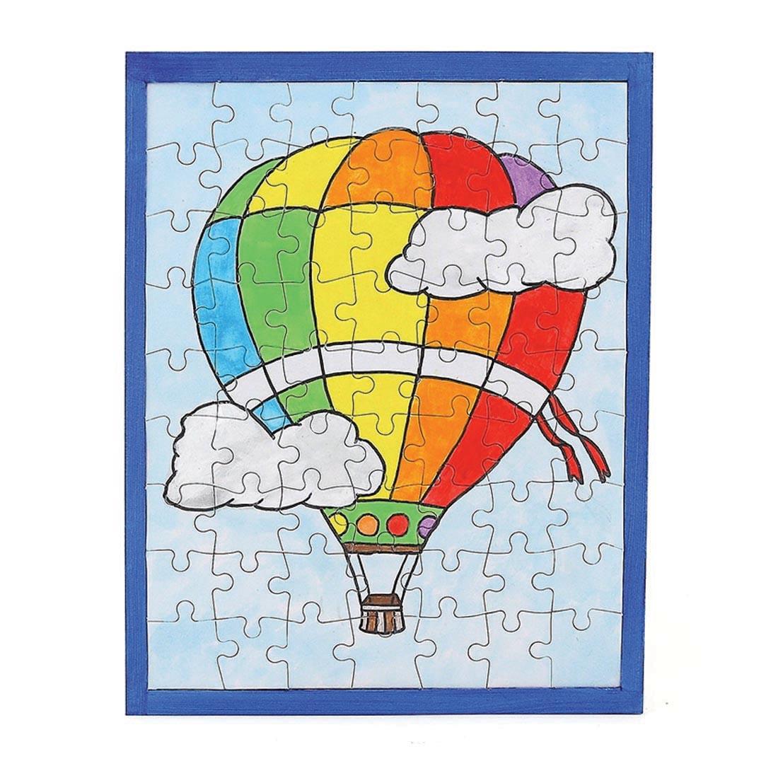 Blank Compoz-A-Puzzle 63-Piece Large Rectangle, shown with a hot air balloon drawn on the puzle