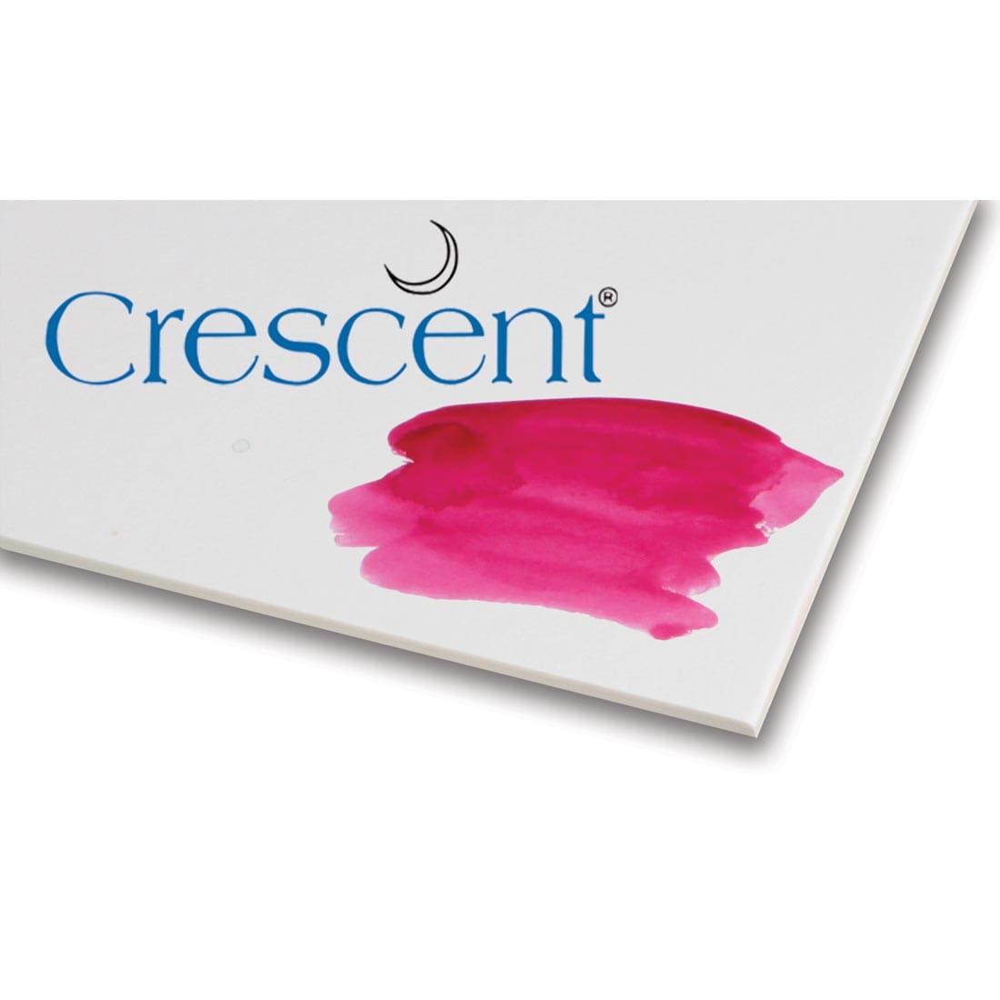 corner of Crescent #114 Watercolor Board with swatch of pink paint