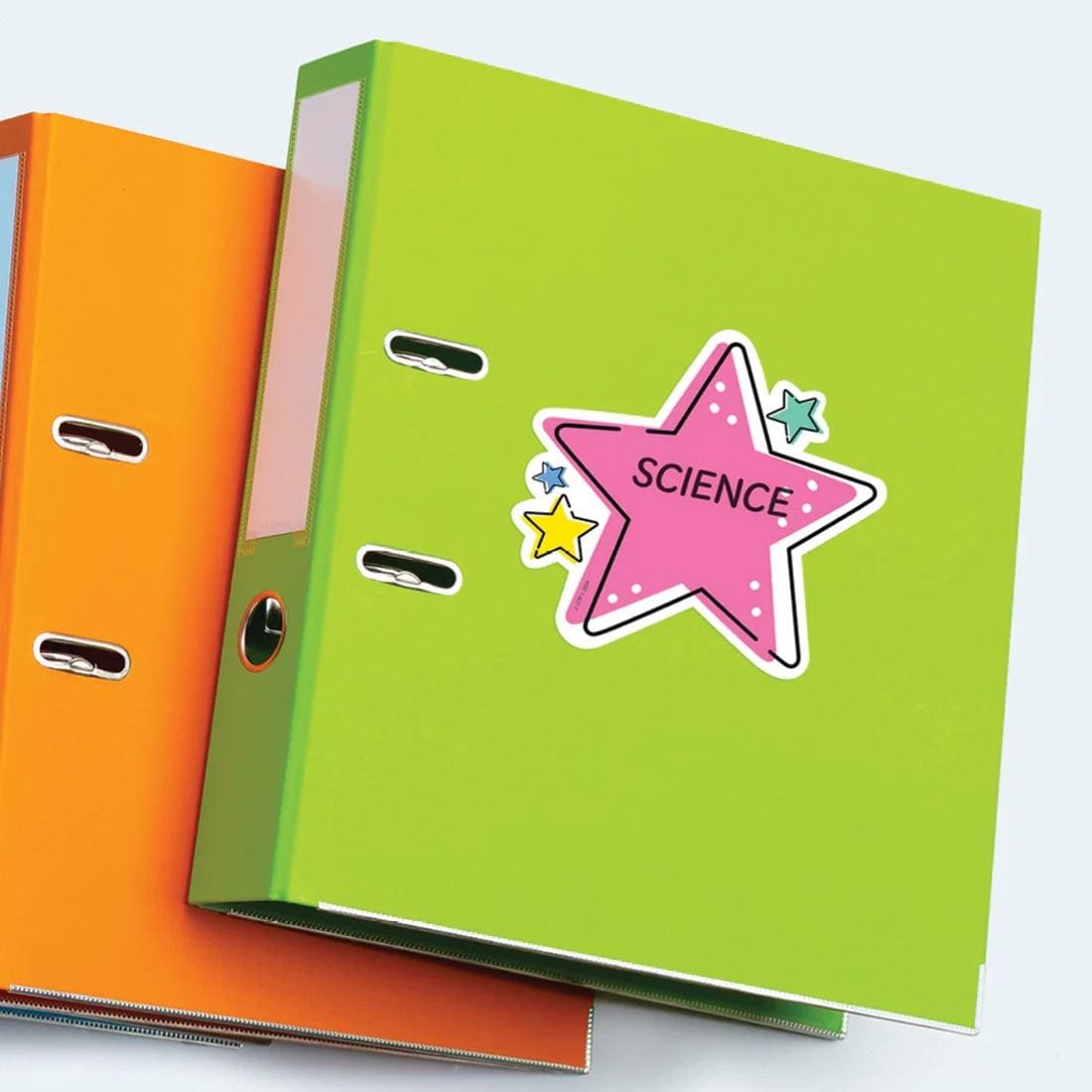 2 binders, one labeled with a Star Designer Cut-Out from the Star Bright collection by Creative Teaching Press with the word Science