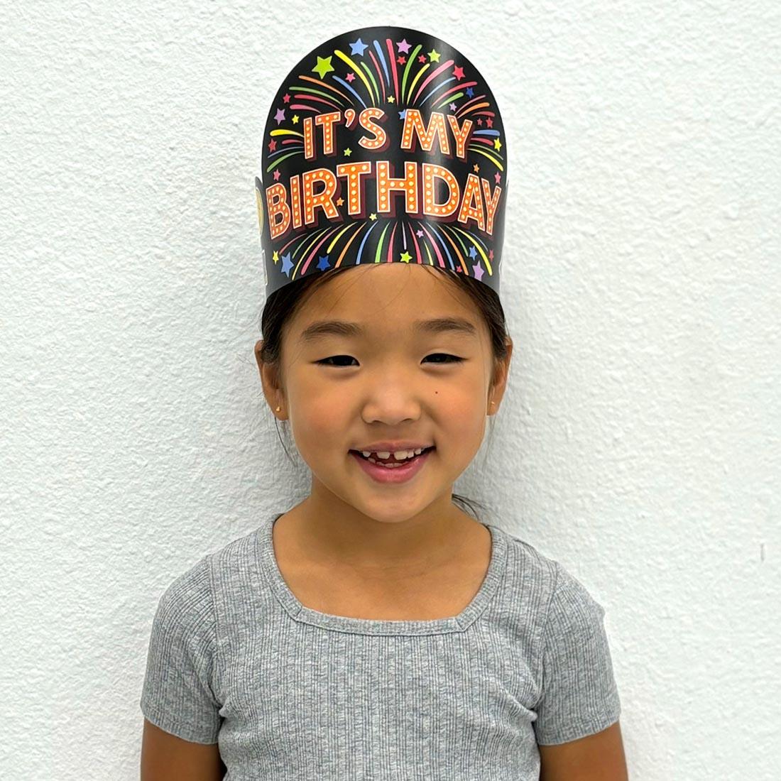 a child wearing a Happy Birthday Crown from the Core Decor collection by Creative Teaching Press