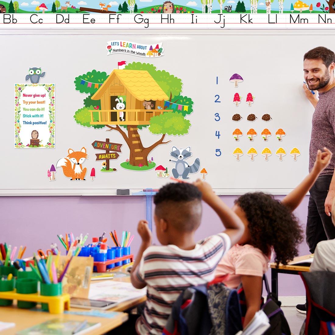 Treehouse Bulletin Board Set from the Woodland Friends collection by Creative Teaching Press on display in a classroom