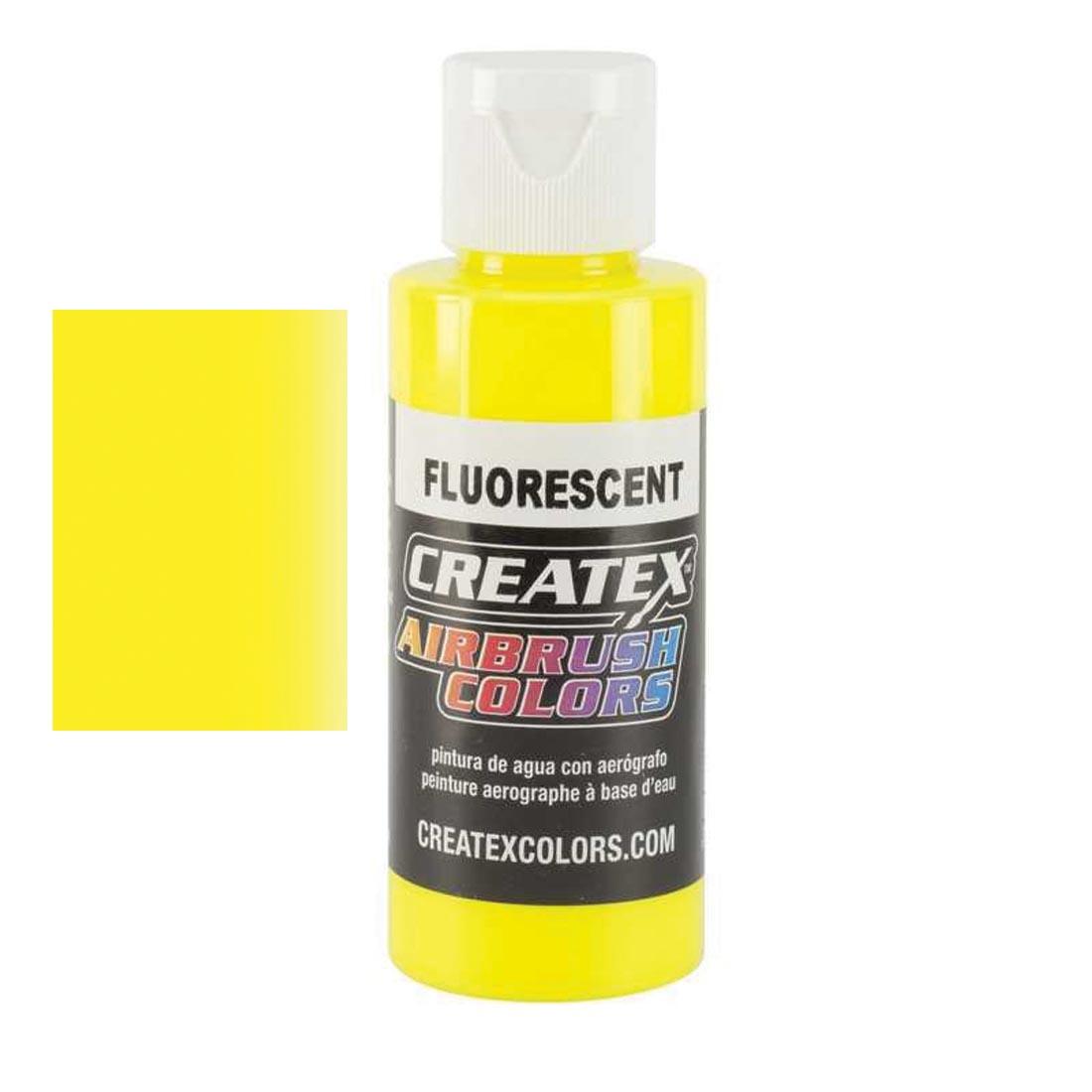 Bottle of Createx Airbrush Color Beside Fluorescent Yellow Color Swatch