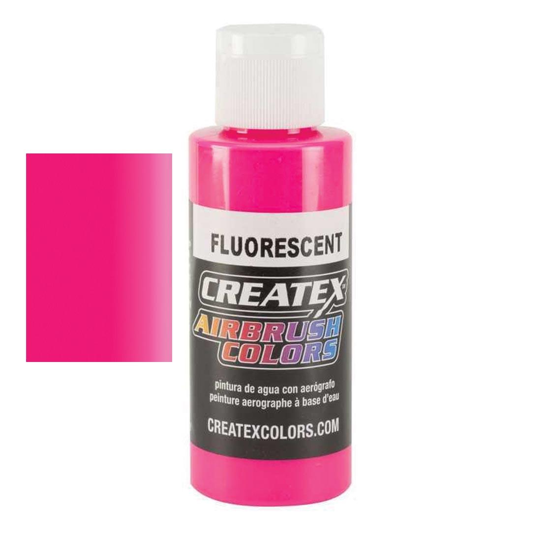 Bottle of Createx Airbrush Color Beside Fluorescent Hot Pink Color Swatch
