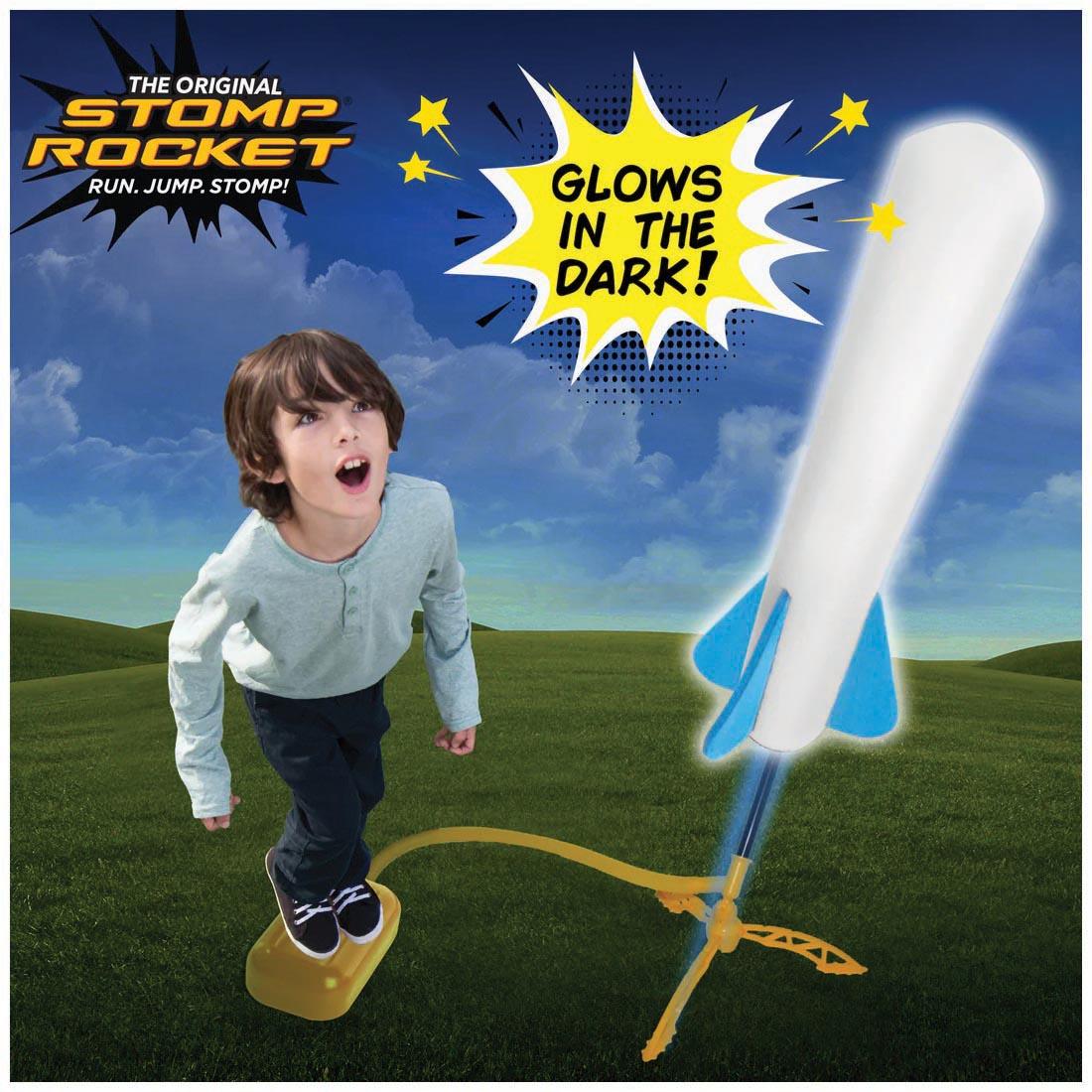 child stepping on a Stomp Rocket Jr. Glow Rocket plus text The Original Stomp Rocket Run. Jump. Stomp! Glows in the dark!