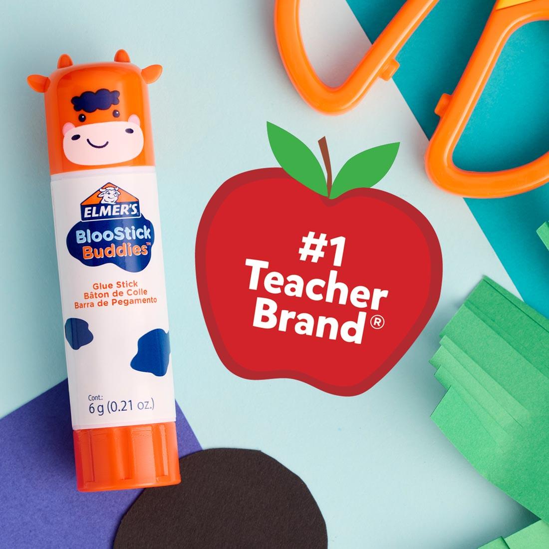 An Elmer's BlooStick Buddies Washable Glue Stick beside a red apple with the words #1 Teacher Brand
