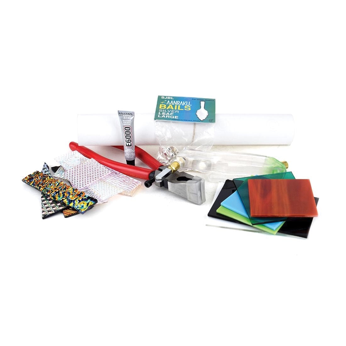 Contents of COE 96 Glass Fusers Starter Kit, showing assorted glass pieces, running pliers, glass cutter and more