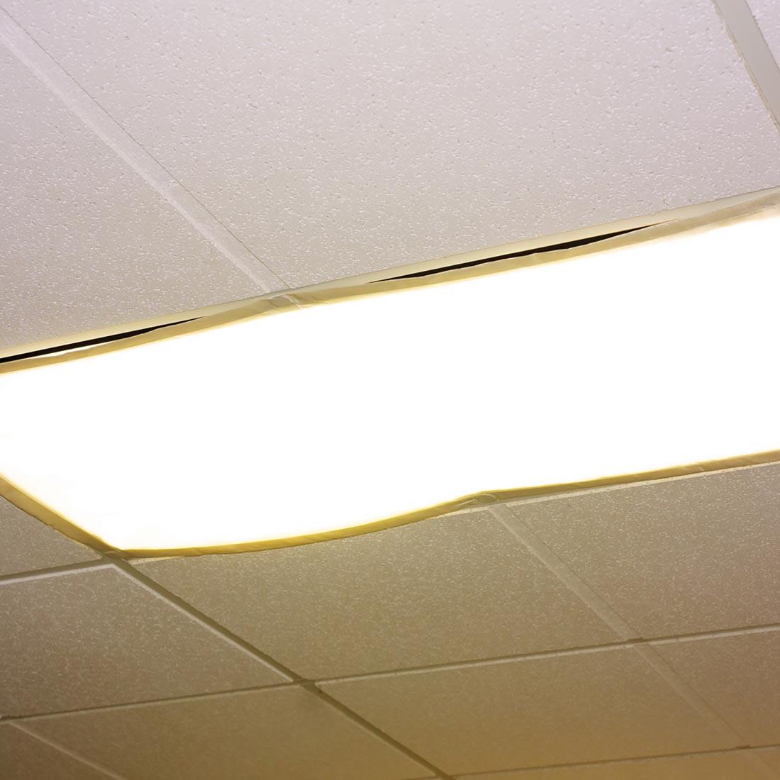 white filter covering an overhead fluorescent light