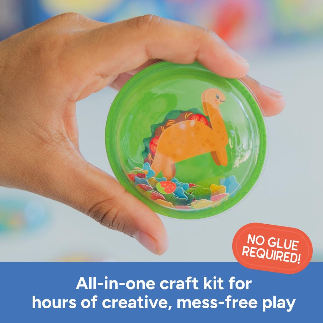 hand holding a sticker made with the 3D Sticker Maker Kit By Educational Insights plus text No glue required! All-in-one craft kit for hours of creative, mess-free play