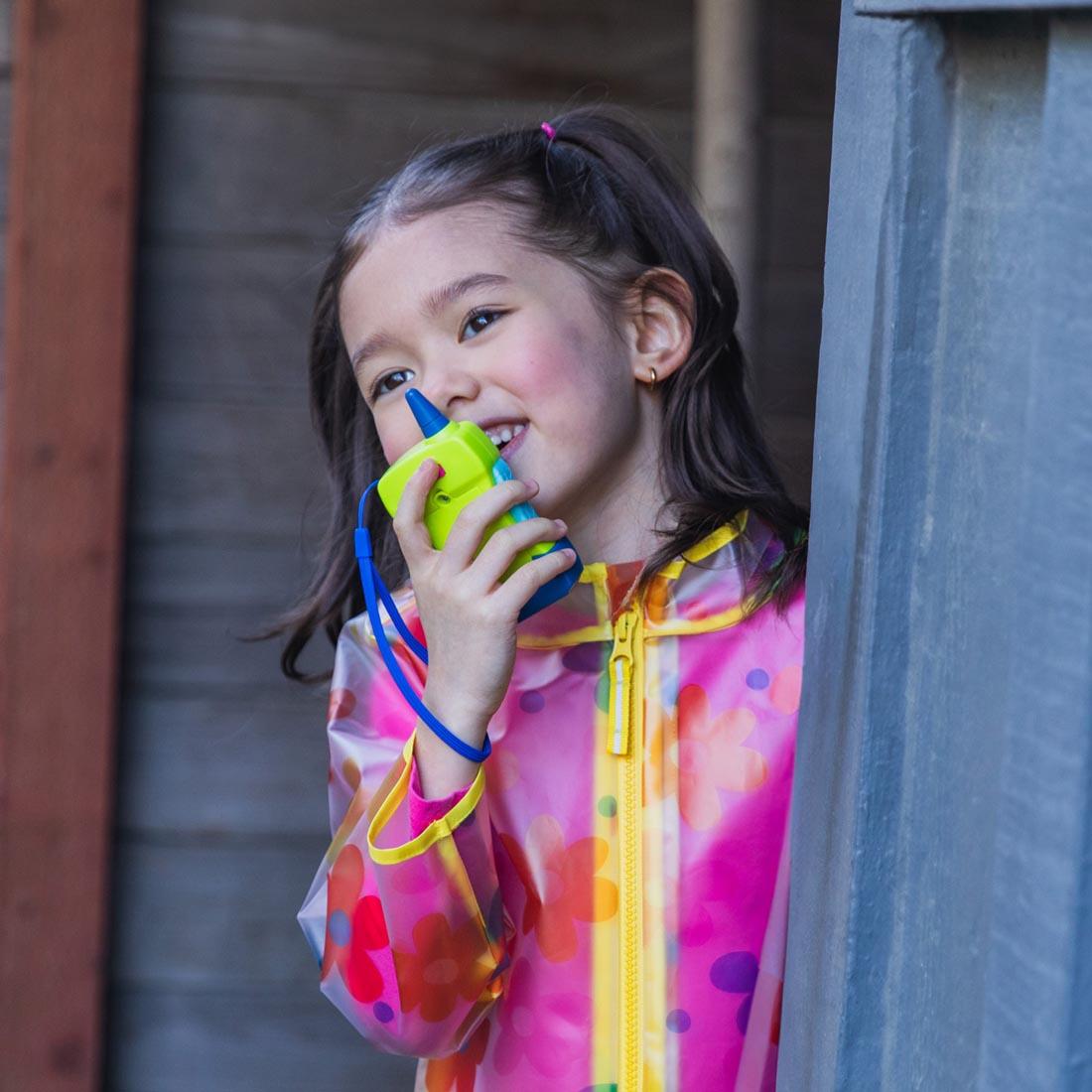 child talking into a My First Walkie Talkie By GeoSafari Jr.