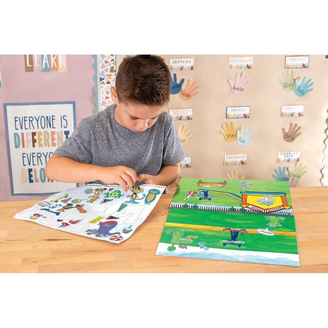 Child playing with the Pete the Cat Reusable Sticker Pad