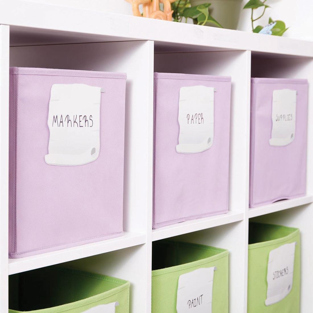 cubby bins labeled using Parchment Paper Cut-Outs from the Once Upon A Dream collection by Eureka