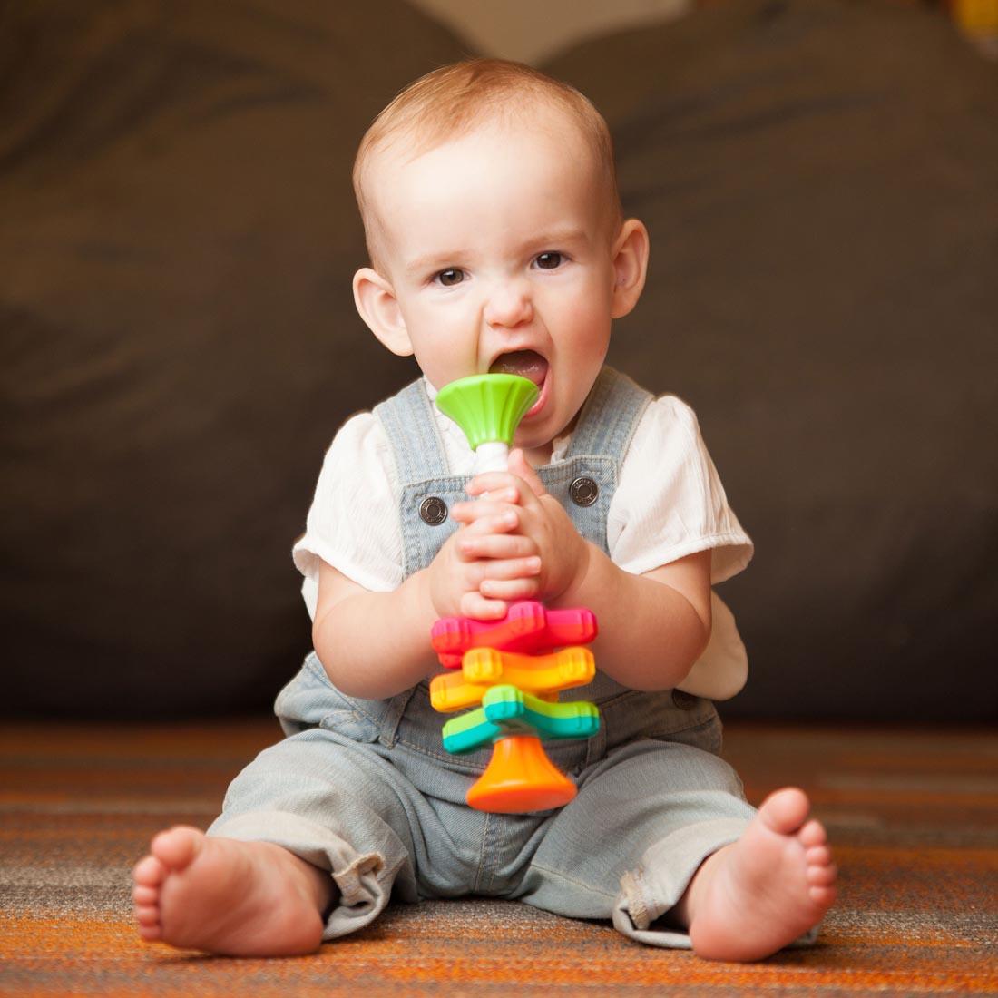 baby playing with the Mini Spinny