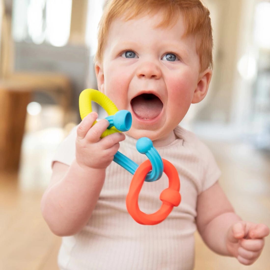 child holding Plip Grips