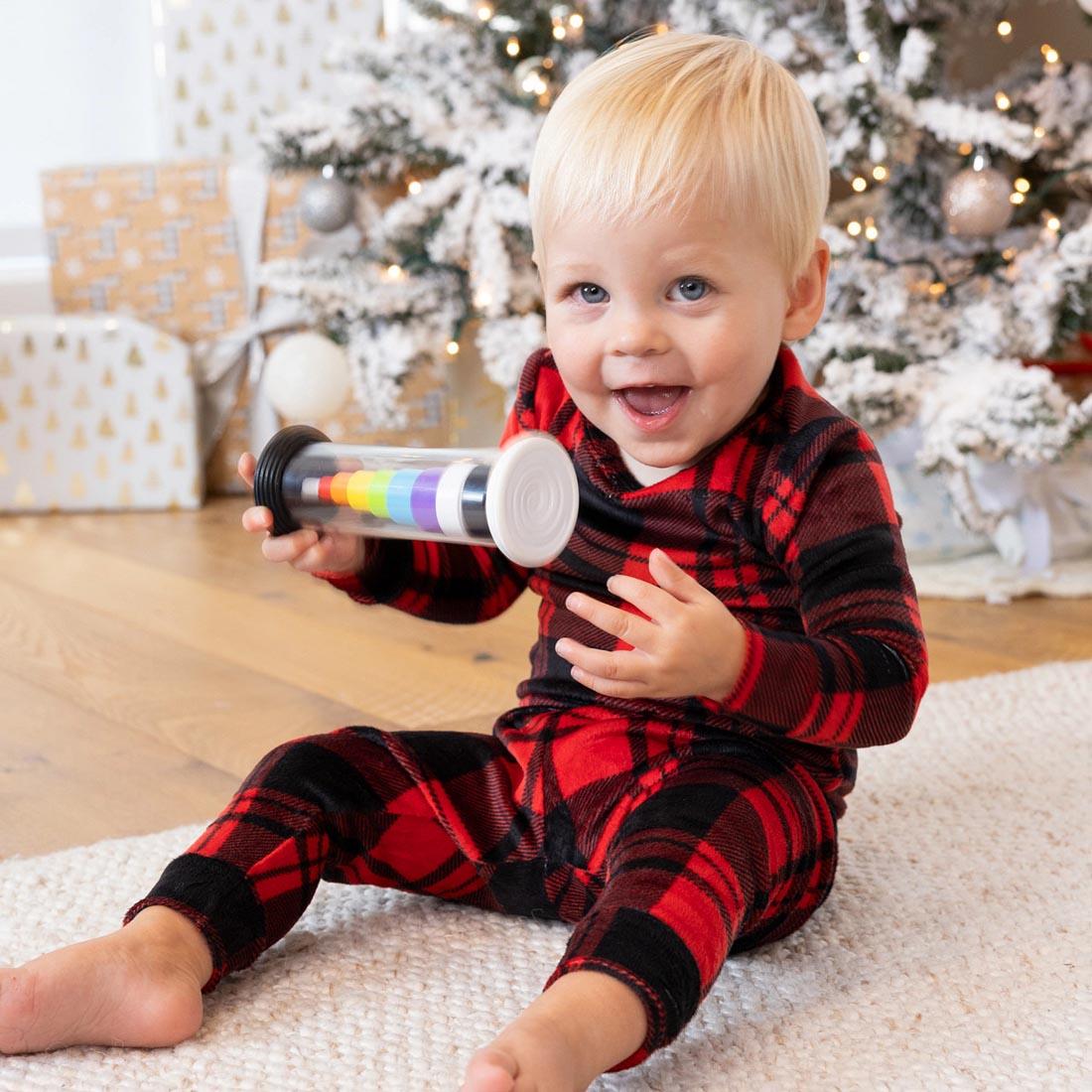 child using the Flipty Toy By Fat Brain Toys