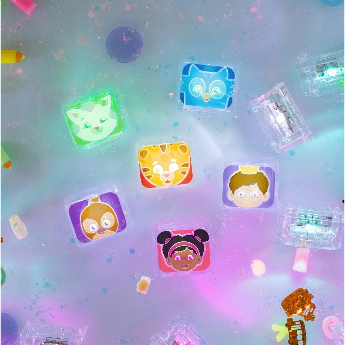 Set of Daniel Tiger's Neighborhood Glo Pals Water-Activated Light Up Cubes under water