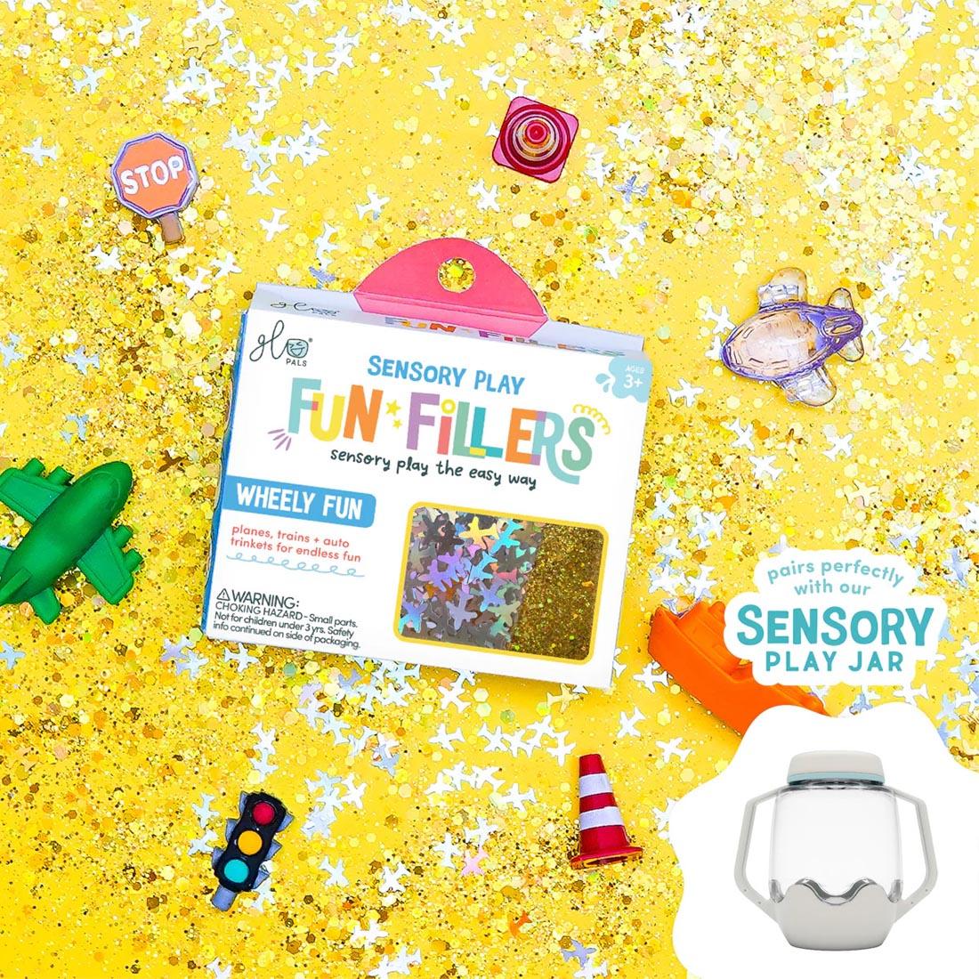 package and pieces from the Wheely Fun Sensory Play Fun Fillers By Glo Pals plus overlay image and text pairs perfectly with our Sensory Play Jar