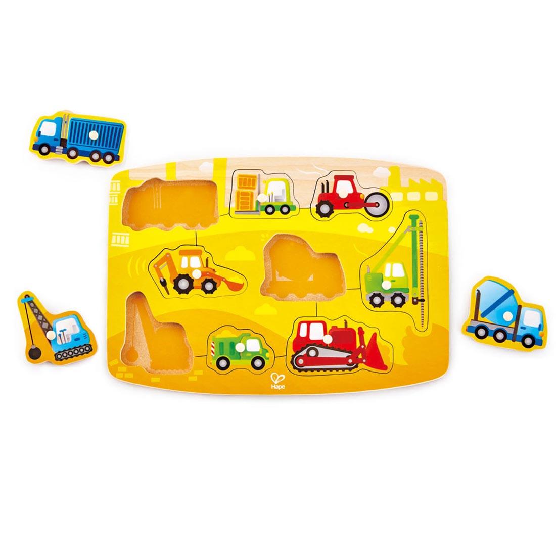 9-Piece Construction Peg Puzzle By Hape with three of the pieces off to the side