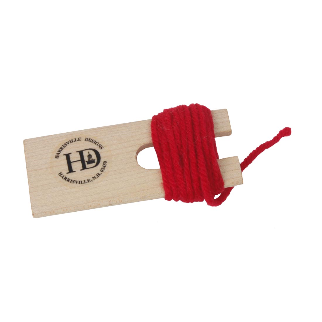 Harrisville Designs Pom Pom Maker in use with red yarn