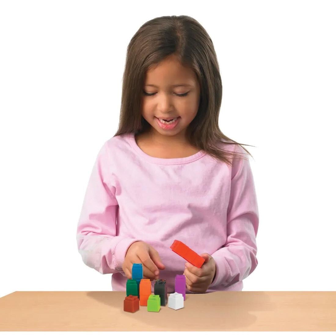 child using UniLink Linking Cubes