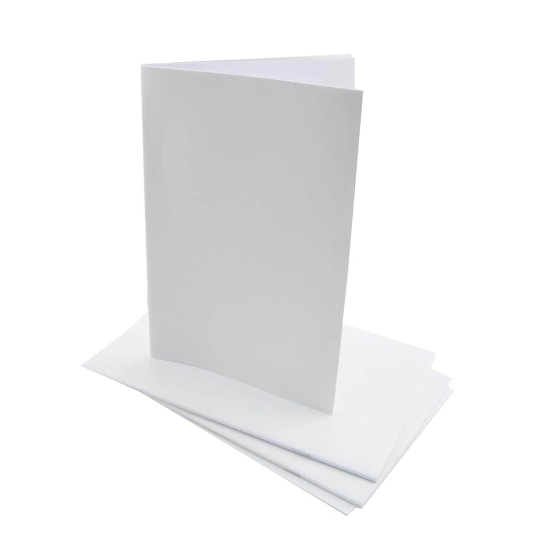 Hygloss White Blank Book standing on top of 3 others