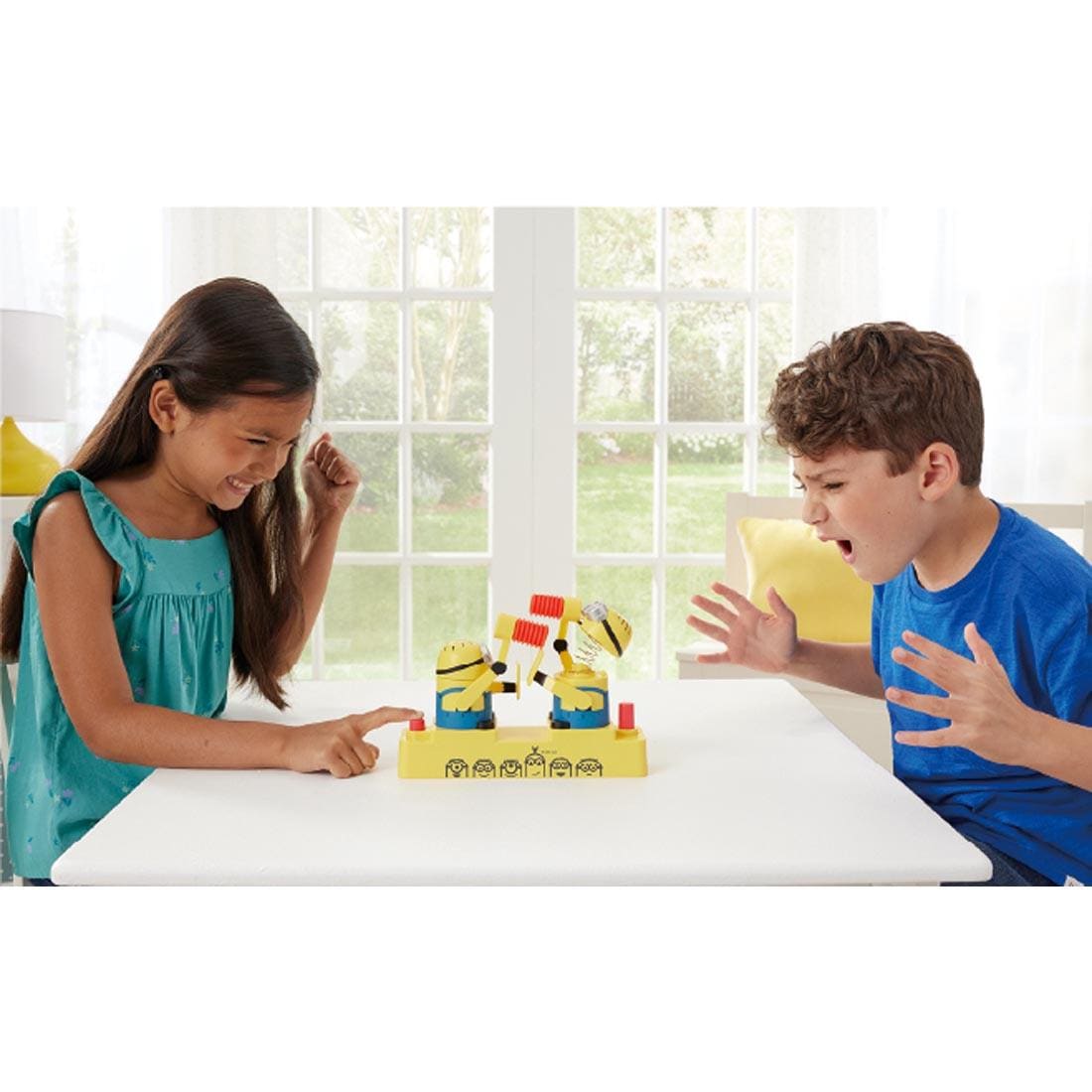 two children playing Minions Hammer Pop