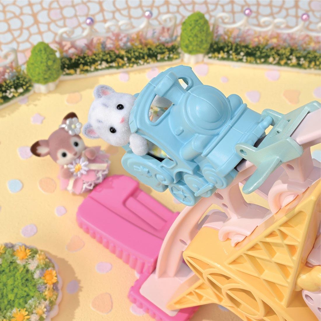 2 critters using the Calico Critters Baby Dream Amusement Park