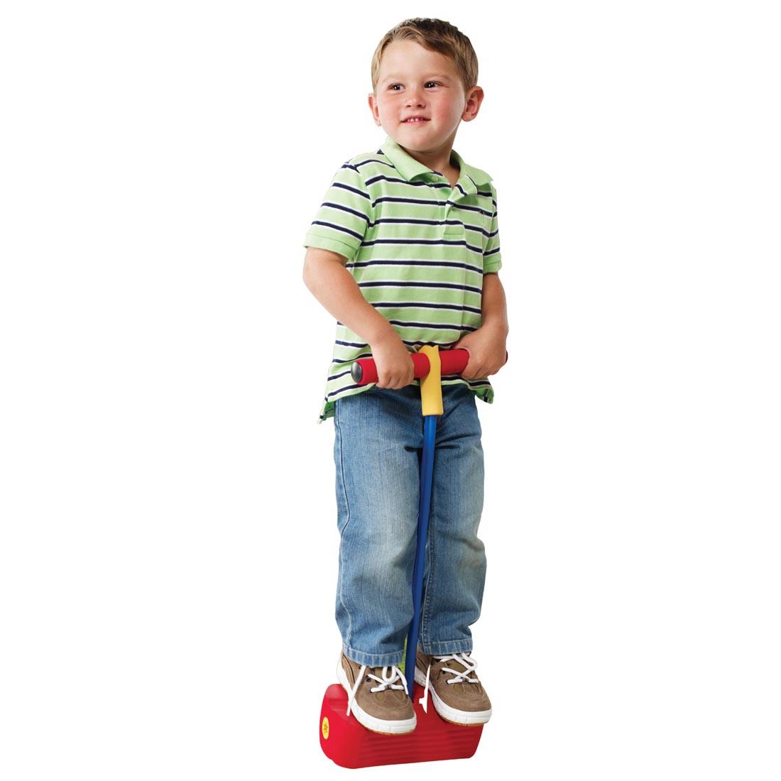 Child on a Kidoozie Hop & Squeak Pogo Jumper