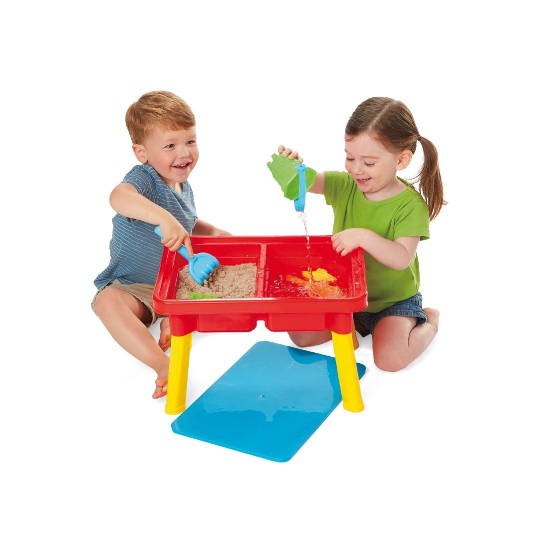 Two children enjoying the Kidoozie Sand 'n Splash Activity Table