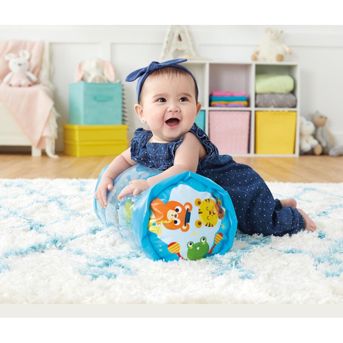 Child laying on the Kidoozie Animal Friends Jumbo Roller