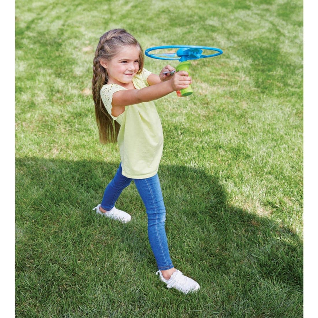 child aiming the Ripcord Flying Disc By Kidoozie