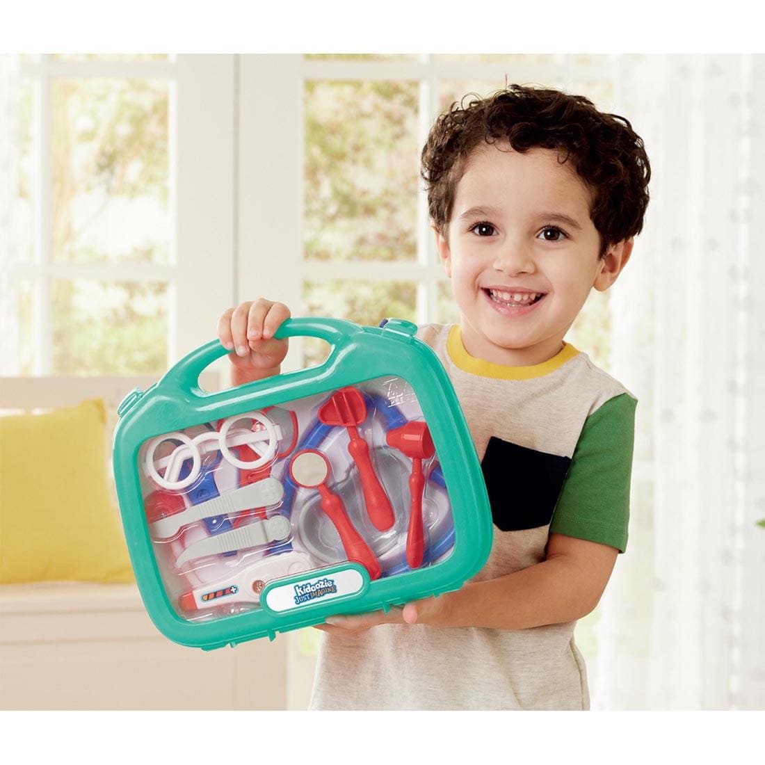 child holding the My First Doctor's Kit By Kidoozie