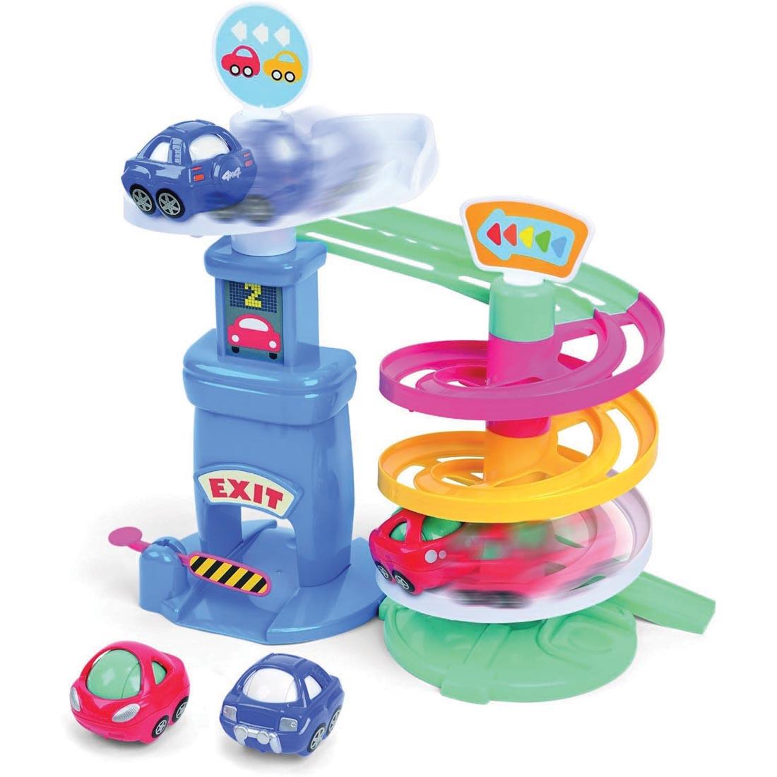 Park 'N Roll Garage By Kidoozie with two of the cars blurred to indicate motion