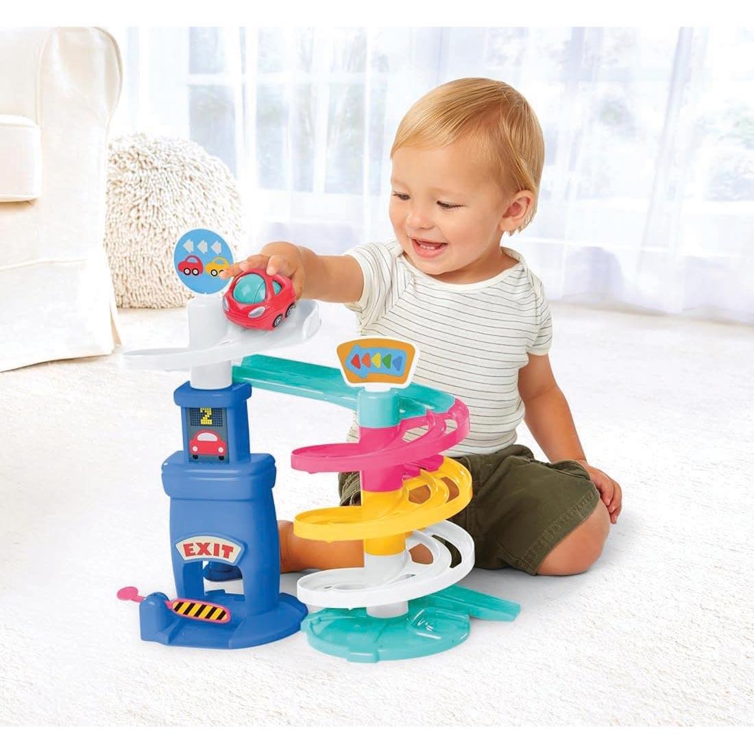 child playing with the Park 'N Roll Garage By Kidoozie