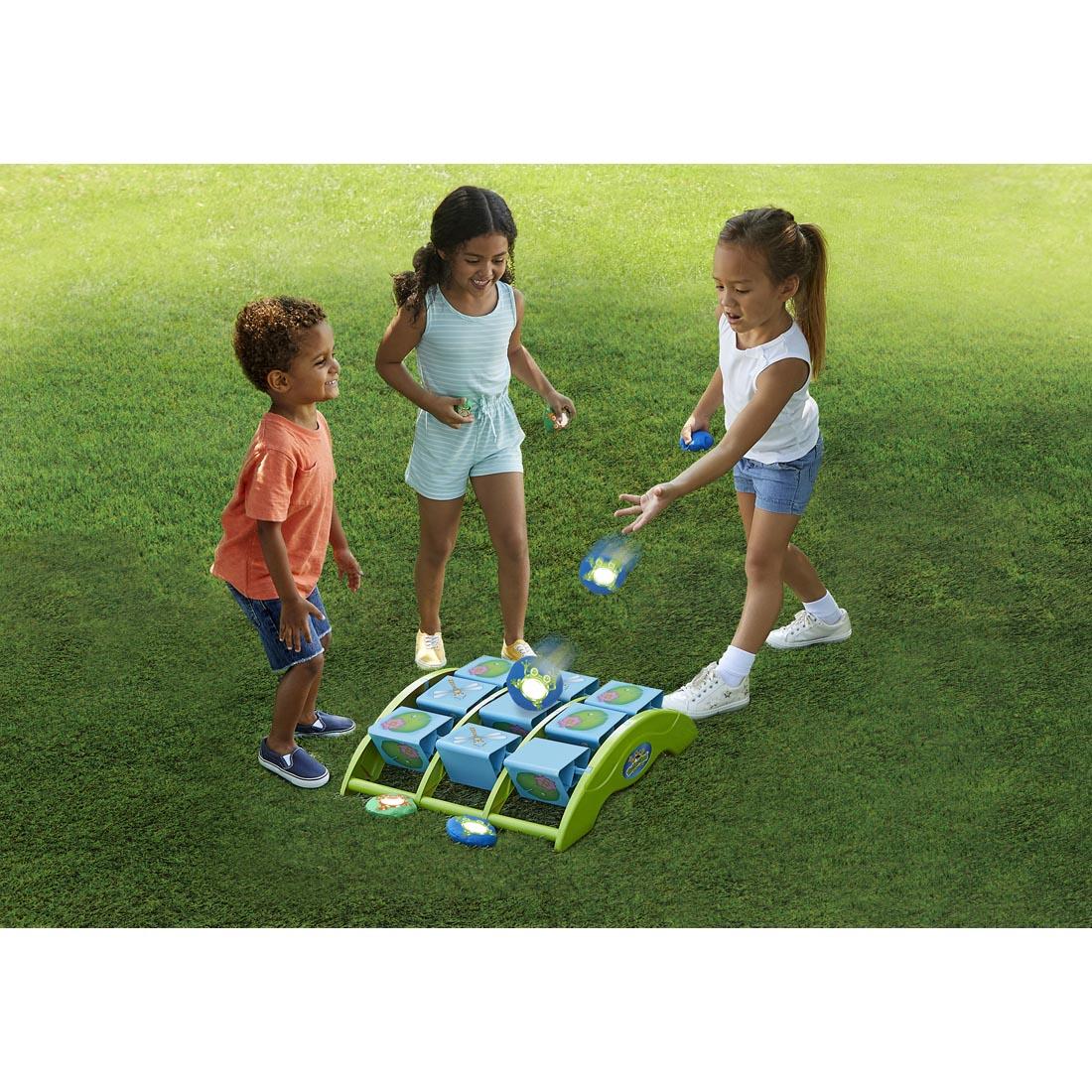 Three children playing the Tic Tac Toad Game