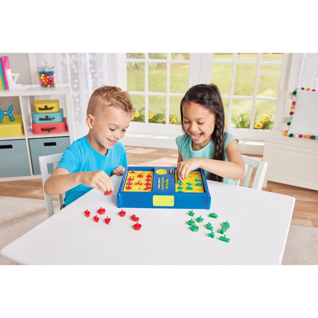 two children playing the Poppin' Puzzlers Game By Game Zone