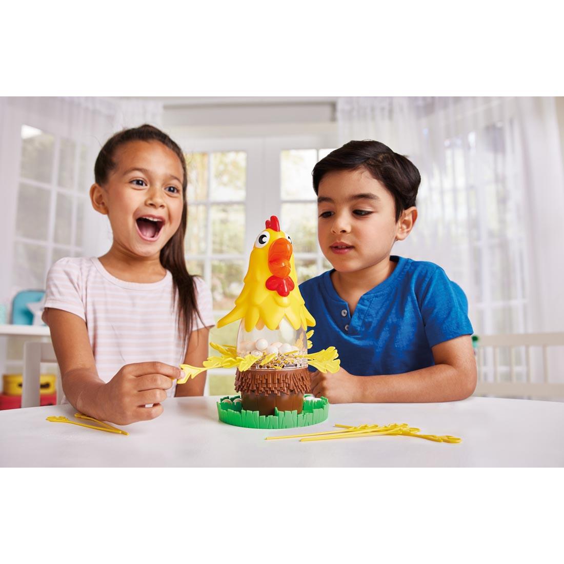 two children playing the Pluck It Game By Game Zone