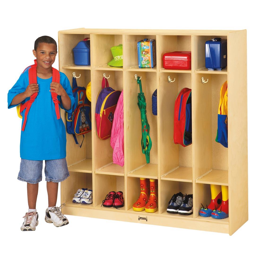 Child standing next to the Natural Birch 5-Section Coat Locker