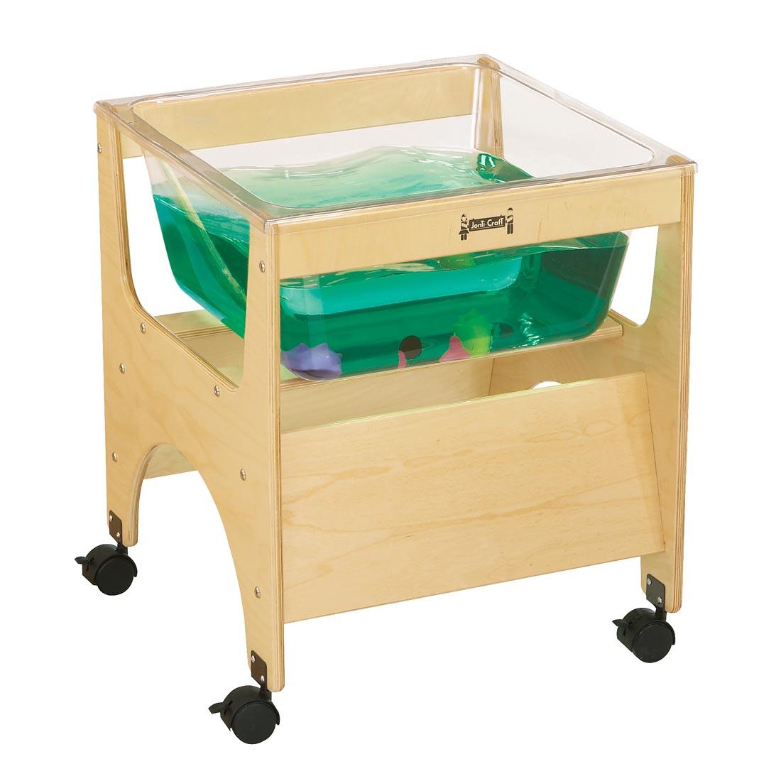 See-Thru Mini Sensory Table with green-colored water in it