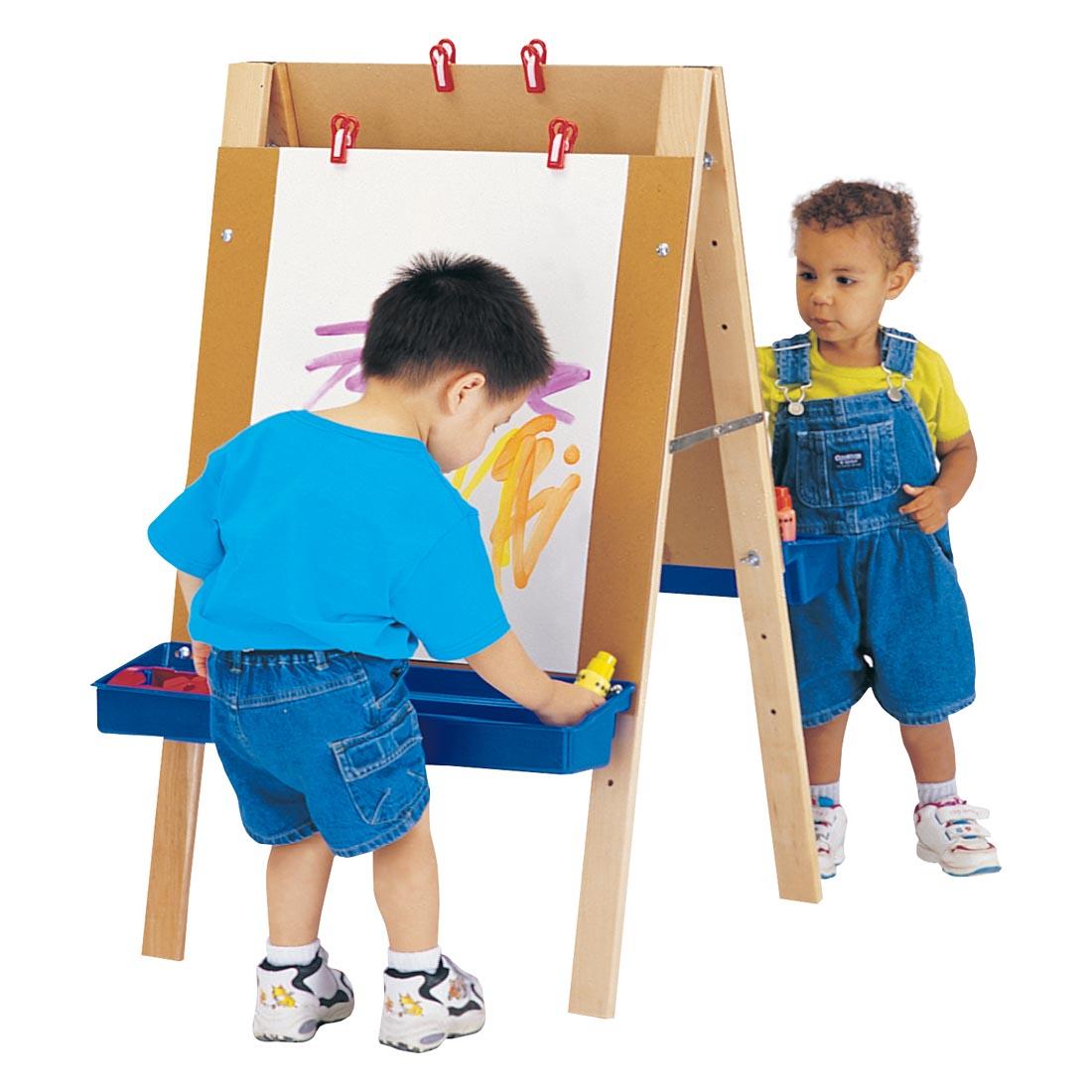 two children standing at the Toddler Adjustable Easel