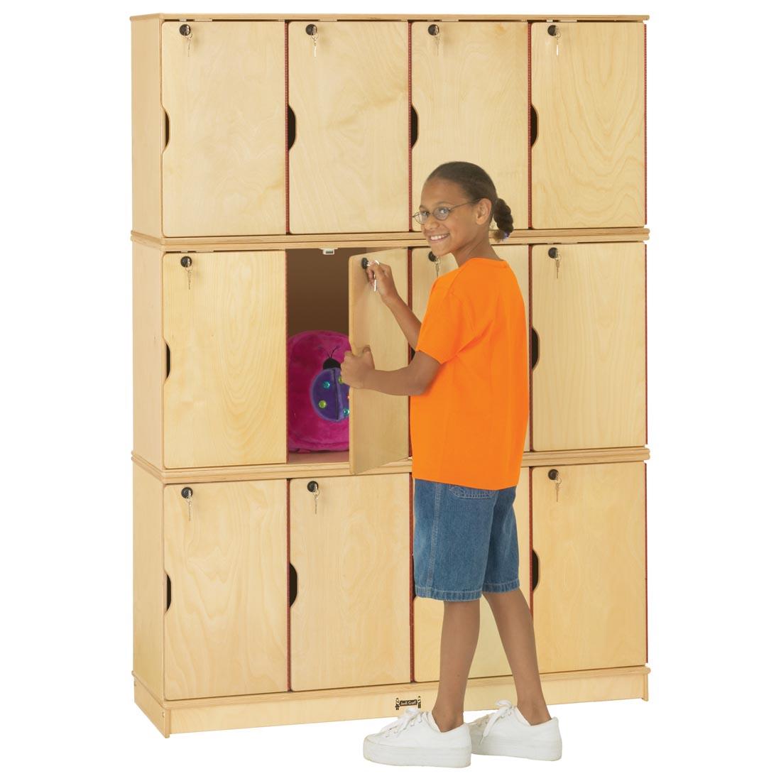 child standing at the Triple Stacking Locker