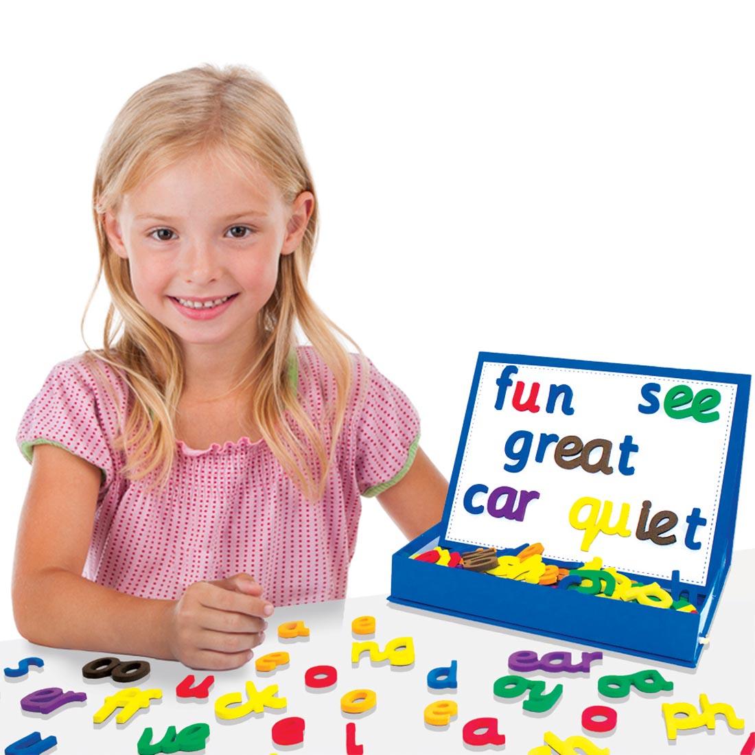 Child using the Rainbow Phonics Magnetic Letters by Junior Learning