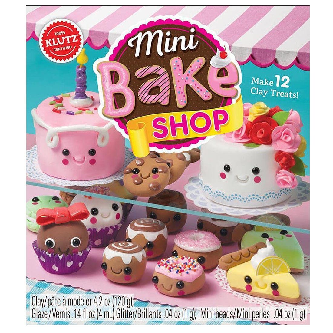 clay craft box shows completed projects of cakes, cookies, doughnuts, pie pieces and more