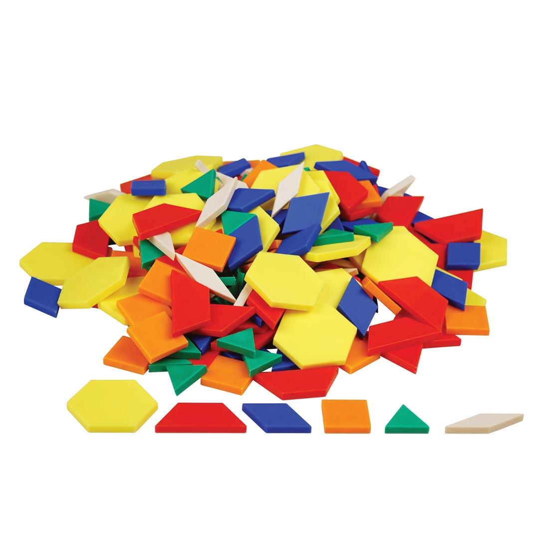 Pile of Plastic Pattern Blocks, with a row of 6 different shapes shown in front of the pile