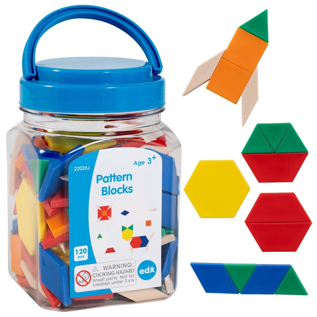 jar of 120 Pattern Blocks plus some in use making shapes beside it